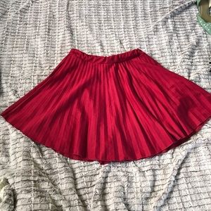 Red pleated skirt